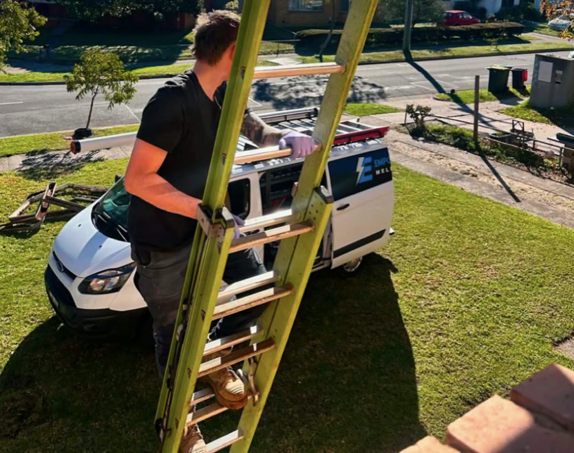 Empowering Melbourne electrician arriving on site with the work van